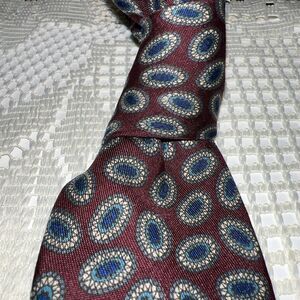Robert Talbott Tie Cabernet Background With Small Paisley In Blue,green & cream